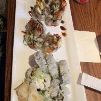 Shrimp Tempura Roll · Deep fried shrimp, avocado, cucumber, tobiko.