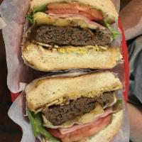 X Salada Burger · Beef burger, cheese, corn, potato stick, lettuce, tomato, and mayo.