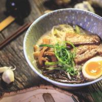 Tonkotsu Ramen · Rich, creamy, 12-hour pork bone broth with braised pork belly, bamboo shoot, egg, wood ear, ...