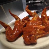 Jumbo Wings · Huge, whole chicken wings served in your choice of reg BBQ,spicy BBQ, Buffalo or our homemad...