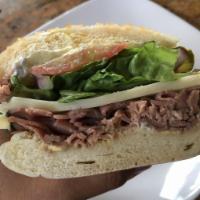 Rutherford Roast Beef Sandwich · Sourdough roll, roast beef, provolone, lettuce, onion, tomato, pickles, creamy horseradish a...