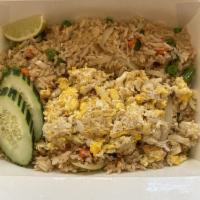 Crab Fried Rice · Jasmine rice with crab meat, egg, peas & carrots, green onion and onion.
