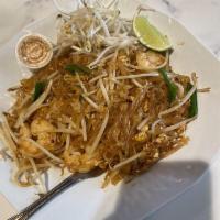 Pad Thai · Rice vermicelli stir-fried in tamarind sauce with an egg, bean sprouts, green onions, crushe...