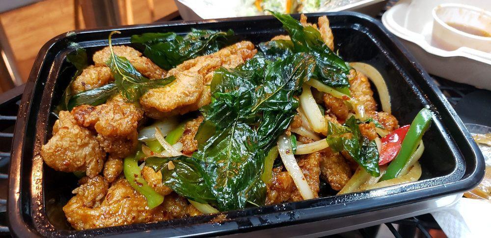 Crispy Basil Chicken · Crispy chicken stir-fried with bell peppers, onions, basil leaves and garlic.