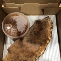 House Calzone · Pepperoni, sausage, mushrooms, onions, mozzarella and ricotta cheese. Add extra sauce for an...