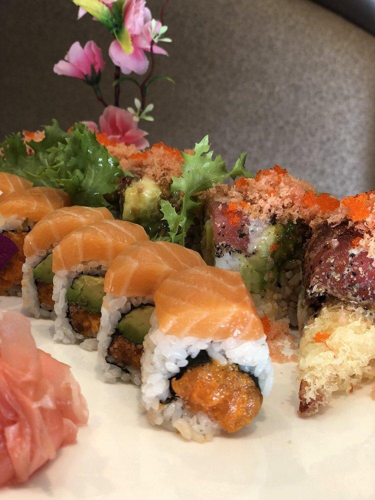 Pink Lady Roll · Raw. Spicy salmon, crunchy and avocado, topped wrapped with salmon.