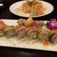 Crazy Friday Roll · Raw. Shrimp tempura, lobster salad, mango topped black pepper tuna, avocado w. wasabi sauce ...