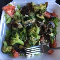 Island Salad · House dressing, lettuce, onions, tomatoes, cucumbers, broccoli, zucchini, bell peppers, mush...