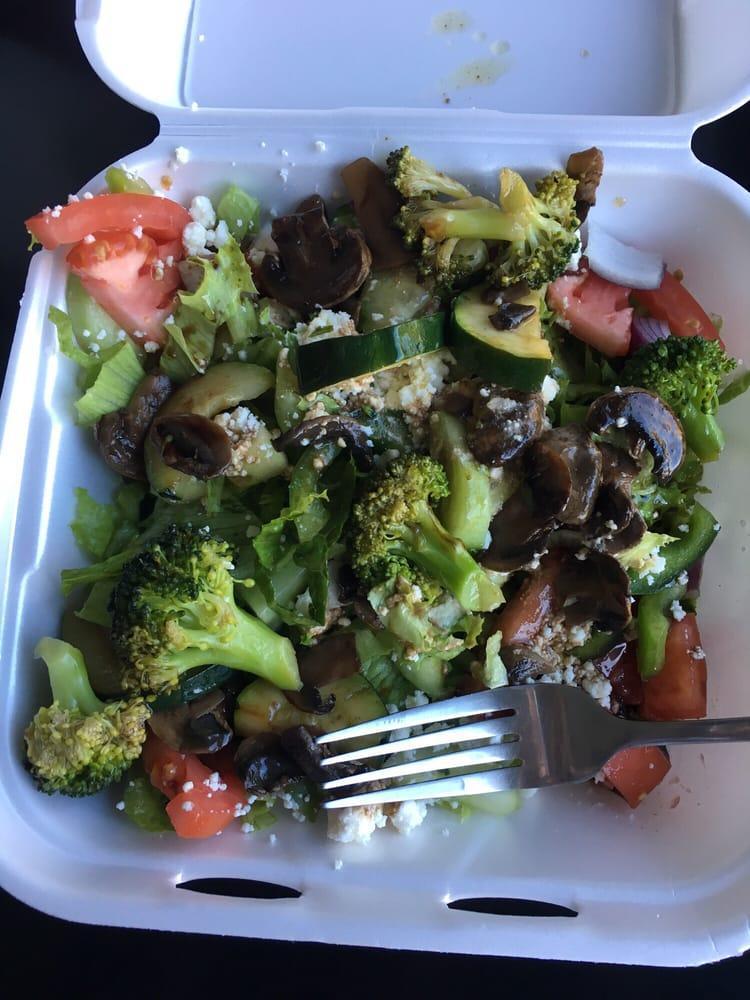 Island Salad · House dressing, lettuce, onions, tomatoes, cucumbers, broccoli, zucchini, bell peppers, mushrooms and feta.