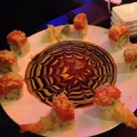 Sex in Kiku Roll · Shrimp tempura, avocado inside and spicy tuna on the top.