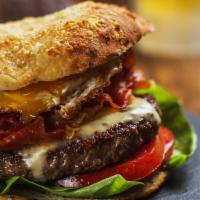 Il Tutto Burger · 8 oz. Kobe beef, lettuce, tomato, prosciutto, sunny-side up egg, American cheese and Thousan...