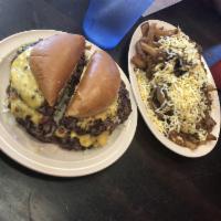 Big Daddy · Ron's legendary giant 1/2 lb. cheeseburger with onions fried into the meat and topped with A...