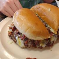 Bacon Cheeseburger · Cheeseburger with onions fried into the meat topped with Ron's cheese blend and real bacon p...