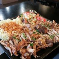 Shawarma Platter · Served with fresh salad & fries or rice made with herbs & bean.