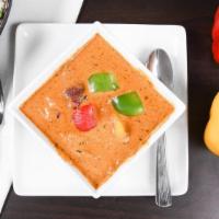 Chicken Tikka Masala · Barbecues chunks of boneless Chicken cooked with onion, tomato sauce and with cream. All ent...