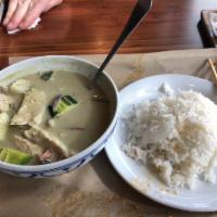 Green Curry · Green chili paste, coconut milk with zucchini, broccoli, onion and bamboo shoots. Served wit...