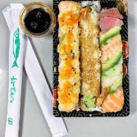 Lion King Roll · Baked roll crab stick, avocado and cucumber top with salmon, mozzarella cheese and mayo sauc...