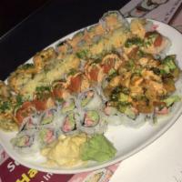 Lenox Roll · Cooked shrimp and spicy crab mix, top with spicy tuna, fried eel, scallion, eel sauce and sp...