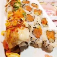 Kiku Special Roll · Wrapped in cucumber, no rice fresh tuna, fresh salmon, crab stick, avocado and masago fish e...