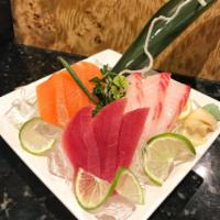 Sashimi · 6 pieces assorted slices of raw fish chef's choice.