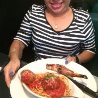 Spaghetti and Meatballs · Enjoy our 3 mouthwatering meatballs and homemade marinara, spun with spaghetti, a classic di...