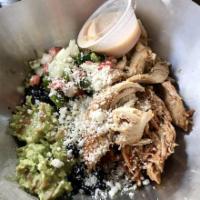 Bueno Bowl · Pulled rotisserie chicken, tossed in our maple chipotle sauce, served with jalapeno salsa, g...