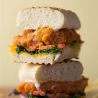 Buffalo Tenders Panini · Lightly breaded tenders tossed with Buffalo wing sauce, cheddar, ranch dressing, field green...