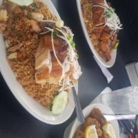 Mixed Fried Rice · Fried rice with pork, shrimp inside and quarter chicken on top