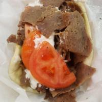Gyros Sandwich · A supreme quality blend of boldly seasoned gyros meat on hot pita bread. Topped with cucumbe...