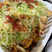 Three Piece Rolled Tacos Combo Plate · 