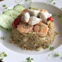 Crab Meat and Shrimp Fried Rice · Served with egg, lump crab meat, onion,tomato,scallion and black pepper.