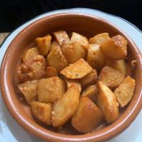 Patatas Bravas · Spicy Spanish potatoes.