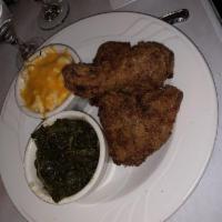 Buttermilk Fried Chicken · Served with slow-cooked greens, 4-cheese, and mac and cheese.
