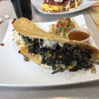 Quesadilla · Flour quesadillas stuffed with sauteed onions, bell peppers, pico de gallo, and house salsa ...