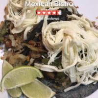 Papazules · 2 soft corn tortilla tacos stuffed with potatoes, onions, fire roasted poblanos chilies, you...