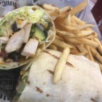 Cancun Chicken Wrap · Grilled or crispy diced chicken breast, shredded cheddar jack cheese, lettuce, tomatoes and ...