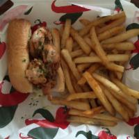 Shrimp Po' Boy · Toasted French bread, battered shrimps, lettuces, tomatoes, top with blazin sauce and served...