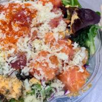 Mambo Combo · Tuna, salmon, mixed greens, purple cabbage, red radish, flying fish roe, soy sauce, and spic...
