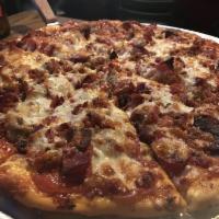 Bypass Pizza · Pizza sauce, pepperoni, Italian sausage, capicola ham, hard salami, bacon and extra mozzarel...