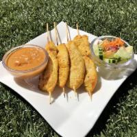 4 Piece Chicken Satay · Grilled marinated chicken served with peanut sauce and cucumber salad.