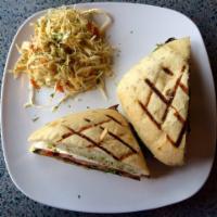 Rustic Eggplant Sandwich · Eggplant cutlet on foccacia topped with fresh mint pesto, roasted peppers, tomato slices and...