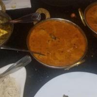Goat Curry · Goat pieces delicately spiced gravy cooked Indian style. Served with basmati rice.
