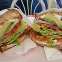 Humming Guru Veggie Sandwich · Served with cream cheese, avocado, cucumber, carrot, bell pepper, tomato and lettuce.