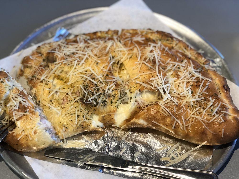 Calzone · Ingredients: Mozzarella, Ricotta, Choice of Toppings


