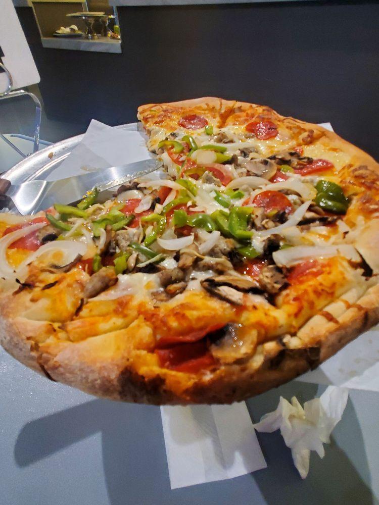Supreme Pizza · Ingredients: Pepperoni,  Sausage, Mushrooms, Onions, Black Olives, Green Peppers