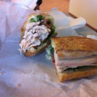 Turkey Club Sandwich · Bacon, lettuce, tomato, and mayo.