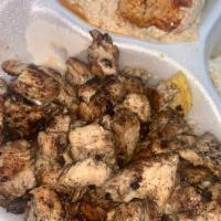 Chicken Kabob Platter · Marinated grilled chicken in garlic, olive oil, and lemon juice, served with sauteed vegetab...