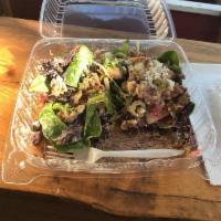 Lamb Gyro Salad · Sliced mix of seasoned lamb and beef roasted on a vertical spit-rotisserie.