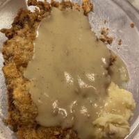 Medium Hired Hand · Texas-sized chicken fried steak with homemade Texas River Bottom gravy. Served with 2 sides.