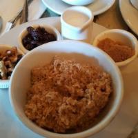 Oatmeal · Served with raisins, walnut and brown sugar.